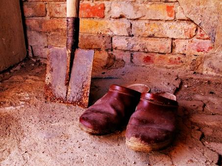 Free Stock Photo of Old shoes with shovel