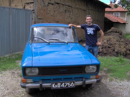 Free Stock Photo of A boy with car in the village