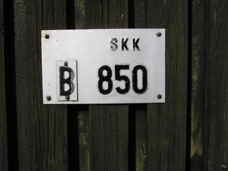 Free Stock Photo of Metal plate on wood