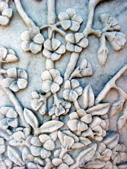 Free Stock Photo of Flowers carved in stone