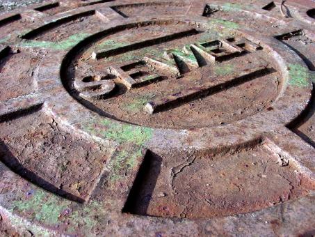 Free Stock Photo of Rusted manhole