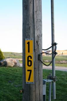 Free Stock Photo of Pole with yellow sign