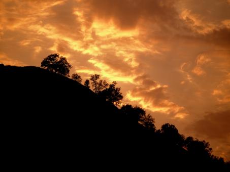 Free Stock Photo of Sunset Behind Mountain