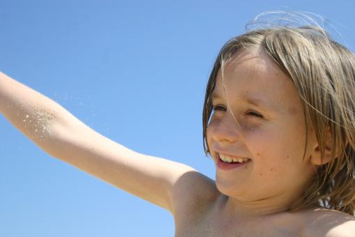 Free Stock Photo of Boy smiling at center of the screen