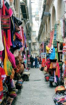 Free Stock Photo of Narrow market street with shops and stan