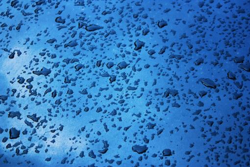 Free Stock Photo of Water drops on blue surface