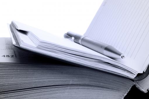 Free Stock Photo of Pen on notebook