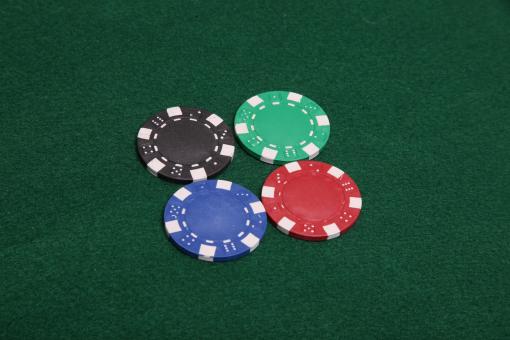 Free Stock Photo of Four Poker Chips