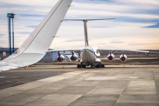 Free Stock Photo of Airplane near the terminal in an airport