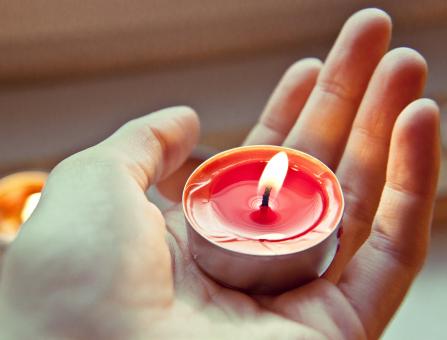 Free Stock Photo of Holding a Candle