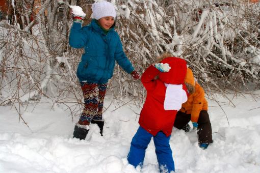 Free Stock Photo of Playing with Snow