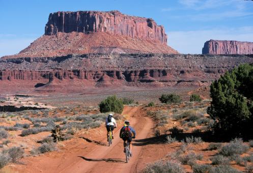 Free Stock Photo of Cycling through the Monument Valley