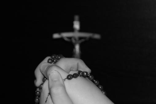 Free Stock Photo of Holding String of Beads