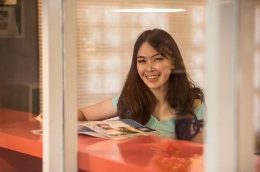Free Stock Photo of Asian Reading Magazine