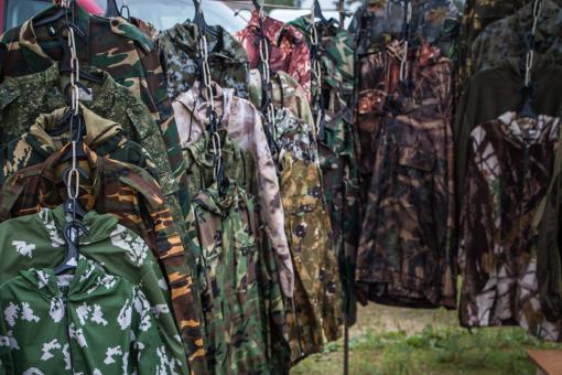 Free Stock Photo of Camouflage clothes stand