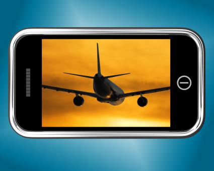 Free Stock Photo of Airplane Flying Towards The Sunset On Mobile Phone