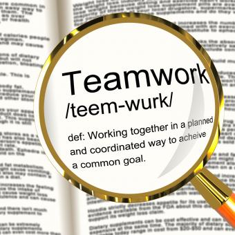 Free Stock Photo of Teamwork Definition Magnifier Showing Combined Effort And Cooperation