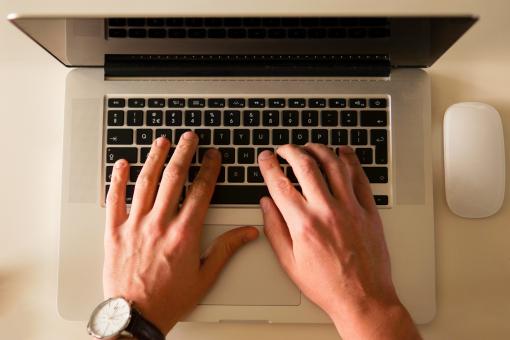 Free Stock Photo of Using Laptop