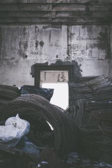 Free Stock Photo of Grungy Shed with Barbed Wire