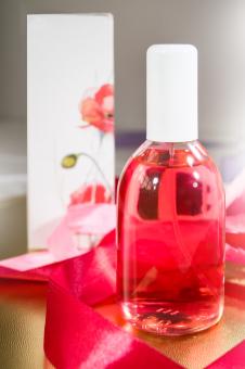 Free Stock Photo of Bottle of Red Cosmetics