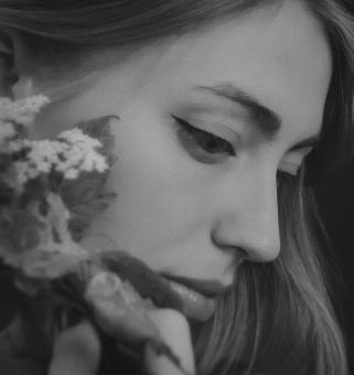 Free Stock Photo of Woman with Flowers Portrait