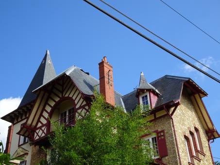 Free Stock Photo of Typical 1900's millstones and wood house