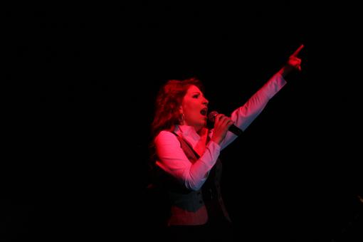 Free Stock Photo of Yonca Lodi Singing on Stage at Festival