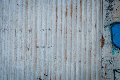 Free Stock Photo of Corrugated Fence And Concrete Texture