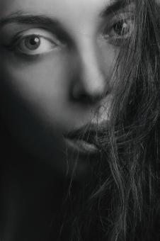 Free Stock Photo of Girl Model with Hair in Mouth - Black and White