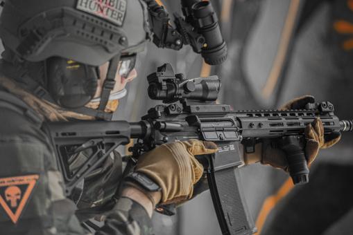 Free Stock Photo of Airsofter aiming with replica