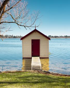 Free Stock Photo of Small Cabin in the Lake