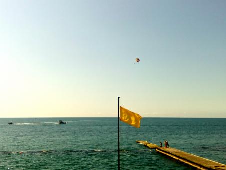 Free Stock Photo of Skydiving above the sea