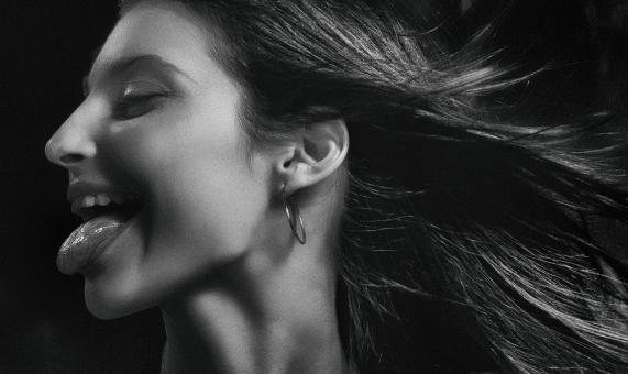Free Stock Photo of Profile of Girl with Tongue Out - Black and White