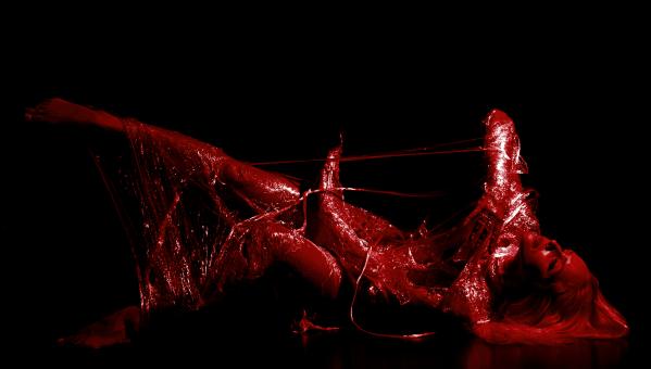Free Stock Photo of Girl in Plastic Wrap - Red and Black