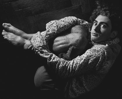 Free Stock Photo of Young Man in Fetal Position