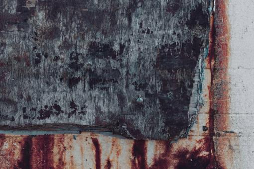 Free Stock Photo of Old Rotten Wood Against Concrete