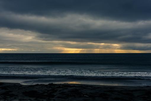 Free Stock Photo of Icelandic Beach and Skies with Shafts of Light