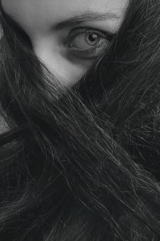 Free Stock Photo of Hidden in Dark Hair