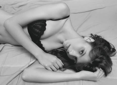 Free Stock Photo of Beautiful Girl in Lingerie Lying on Bed