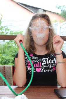 Free Stock Photo of Girl Smoking Shisha