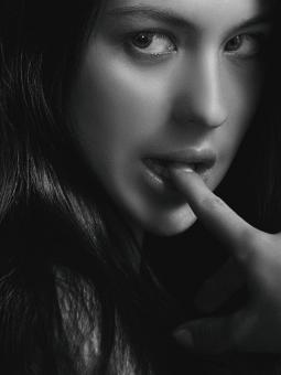 Free Stock Photo of Girl Biting Finger - Monochrome