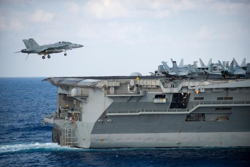 Free Stock Photo of Fighter Jet Landing on Aircraft Carrier