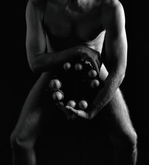 Free Stock Photo of Naked Man Holding a Circle of Eggs