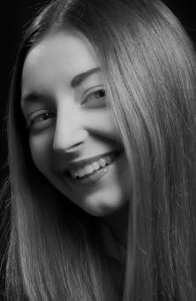 Free Stock Photo of Happy Young Woman - Black and White Portrait