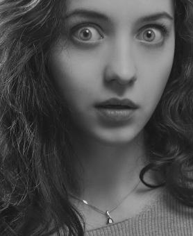 Free Stock Photo of Girl Surprised - Black and White Portrait