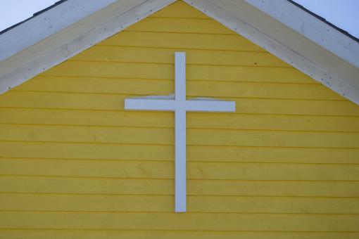 Free Stock Photo of White Cross on Church Wall