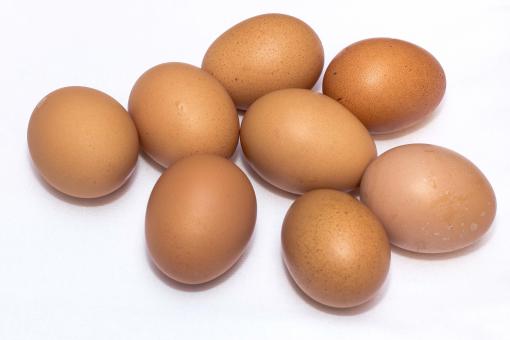 Free Stock Photo of Brown Eggs on White Surface