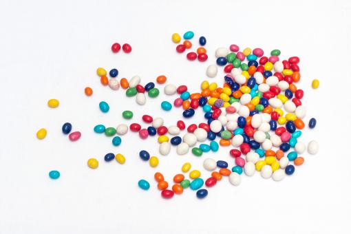 Free Stock Photo of Scattered Candy on White