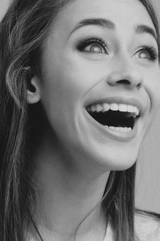 Free Stock Photo of Laughing Woman Portrait - Monochrome