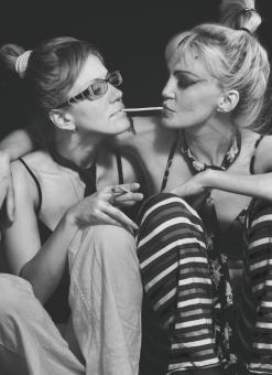 Free Stock Photo of Two Girls Sharing a Straw - Black and White Portrait